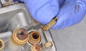 2. inspect the valve seat and needle.