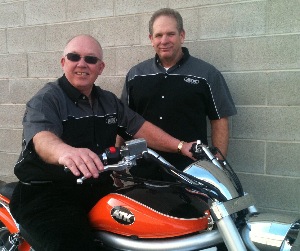 Jon Syverson (on motorcycle) and ATK CEO Frank White